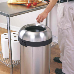 60L bullet open bin - brushed stainless steel - lifestyle man throwing rubbish away image